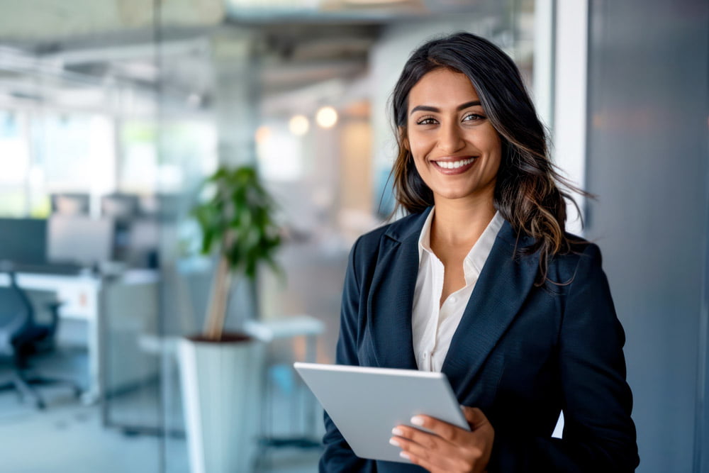 Confident Mixed-Race Businesswoman Holding Digital Tablet in Mod